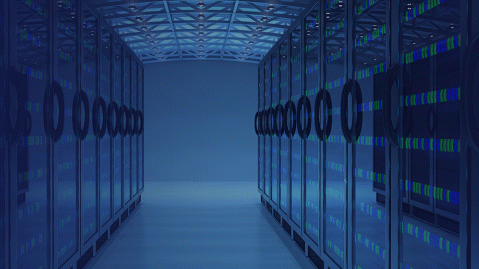 Glass fronted server room with green and blue lights