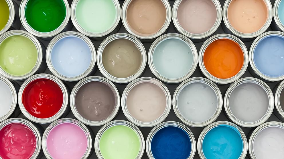 Three rows of open paint pots showing different colour paint