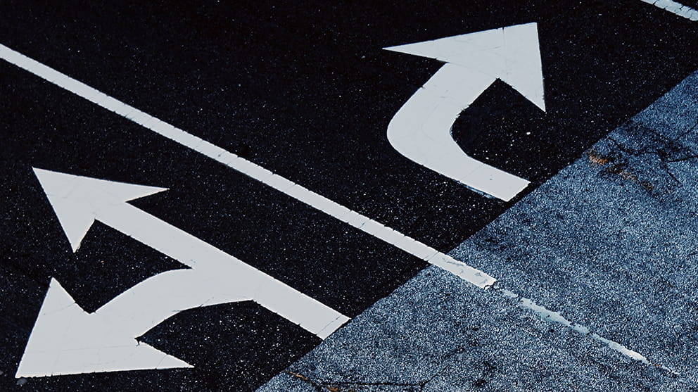 Close up of arrow road markings