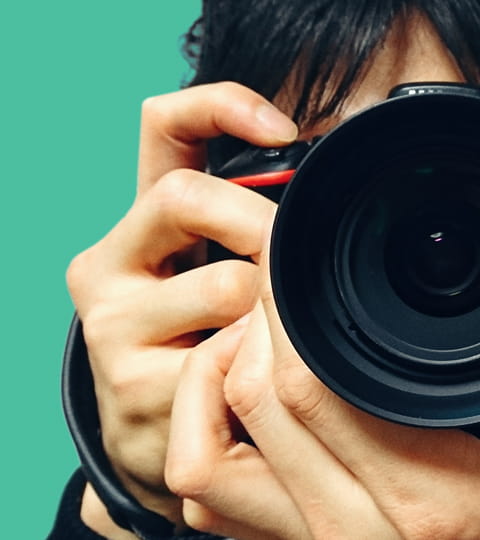 Taylor Wessing supports National Portrait Gallery Hold Still - close up of person with camera