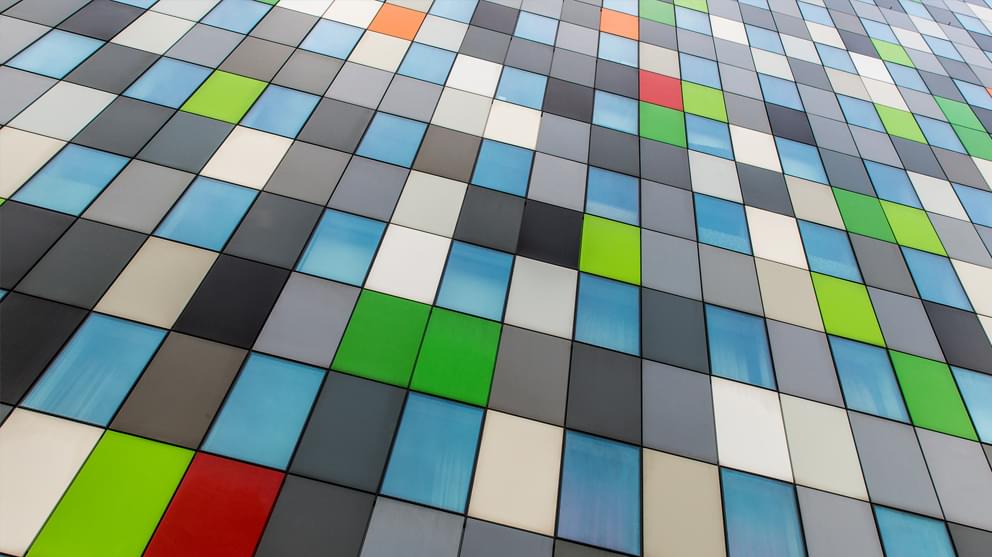Fragment of a multi colored glass facade