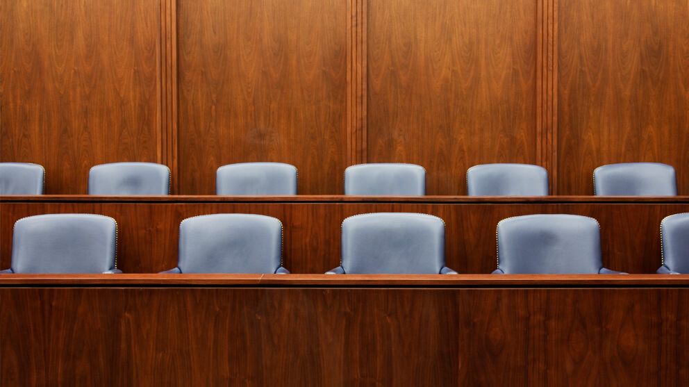 Empty chairs in jury box