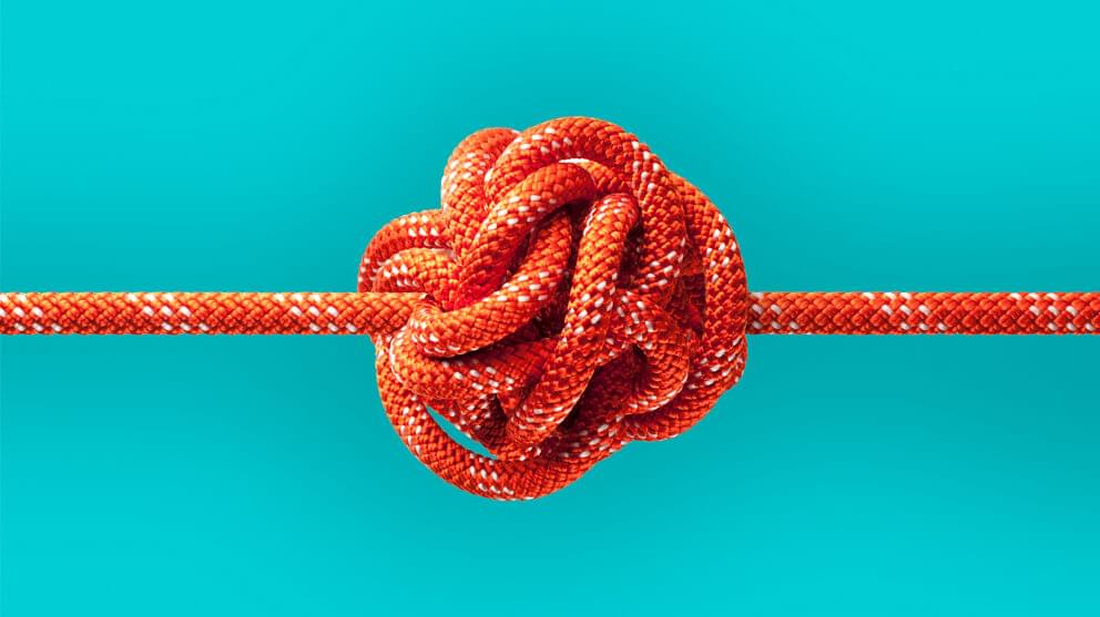 Red knotted rope close-up