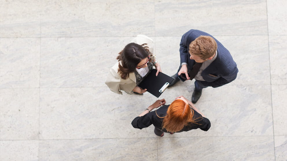Business team discussing view from above