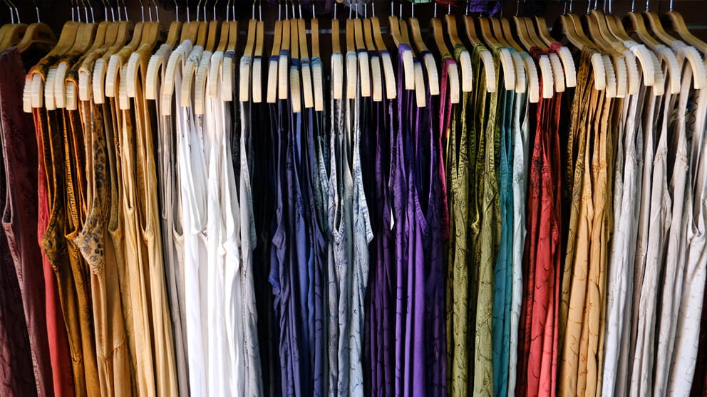 Multi-coloured dresses on hanger