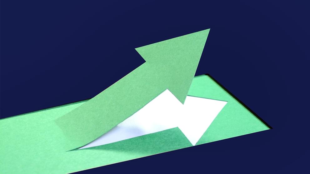 Green up arrow on navy blue background