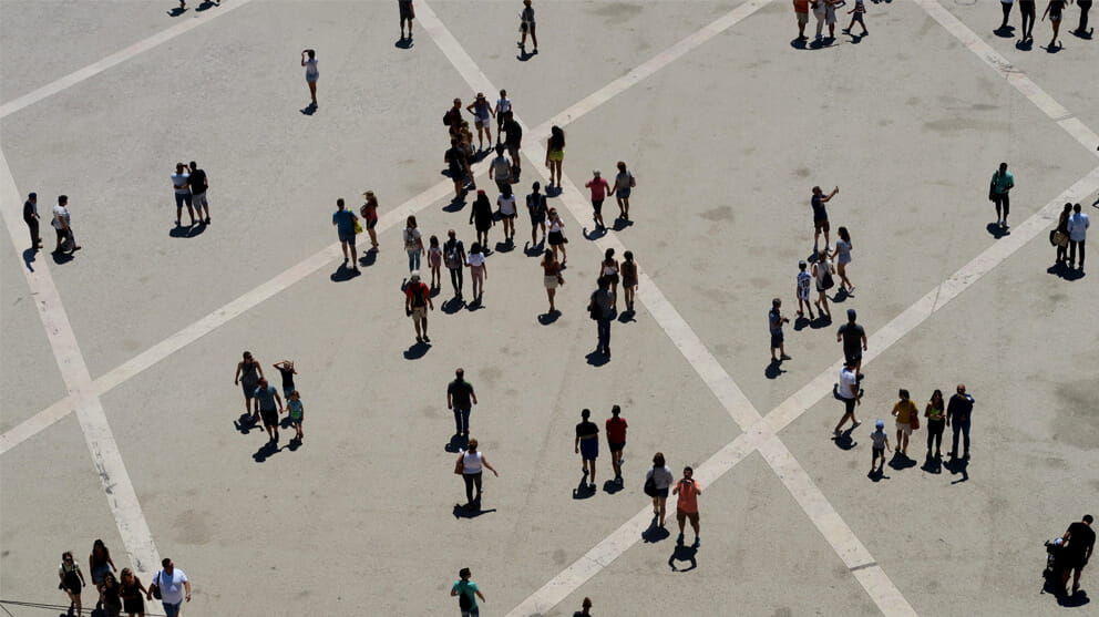 High Angle View Of People Walking On Road In City