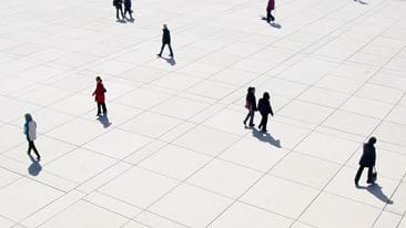 People crossing open space
